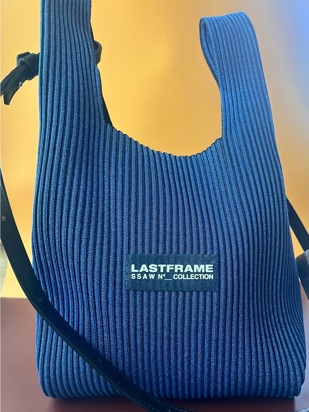 LASTFRAME metallic blue ribbed Crossbody Bag with Black Strap